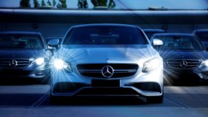 Mercedes Benz cars parked