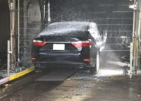 black car in car wash shop